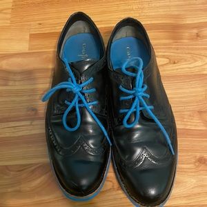 Cole Haan black and blue wing tip Oxford shoes